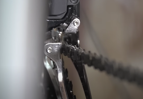 Adjust the inner plate of the derailleur