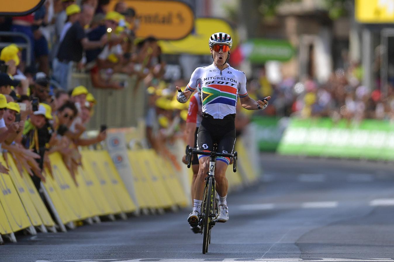 Impey crossing the line for his Tour de France stage win in the national kit for South Africa