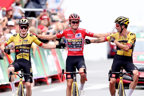 The Jumbo-Visma trio crossed the line arm in arm on stage 20 with Sepp Kuss' overall victory all but confirmed