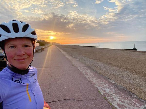 Kate Strong enjoys the sunset during her lap of the United Kingdom