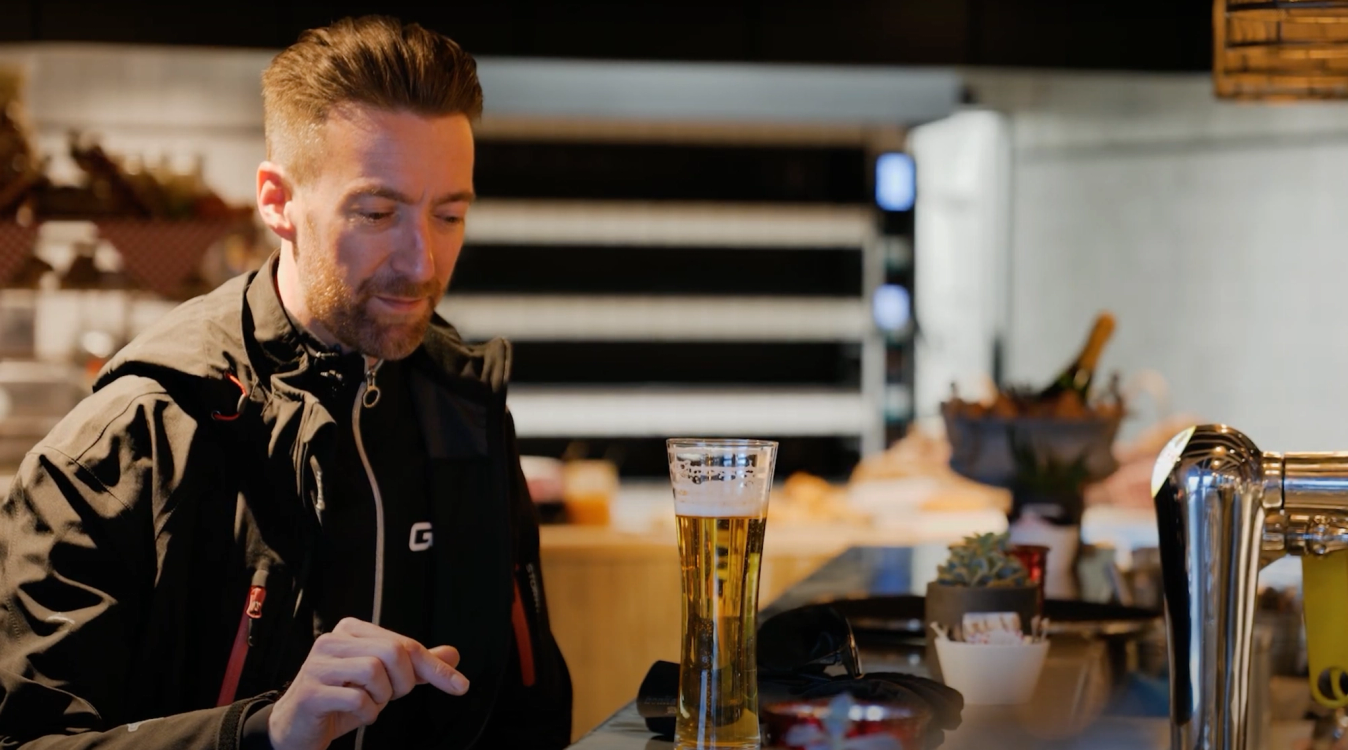 GCN Presenter Dan Lloyd about to drink a pint of lager