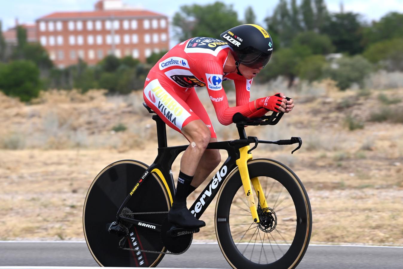 Sepp Kuss produced the best time trial of his career to maintain a handsome lead in the red jersey