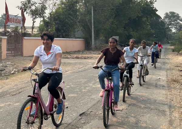 Pragnya Mohan leads the first cohort of girls on a ride