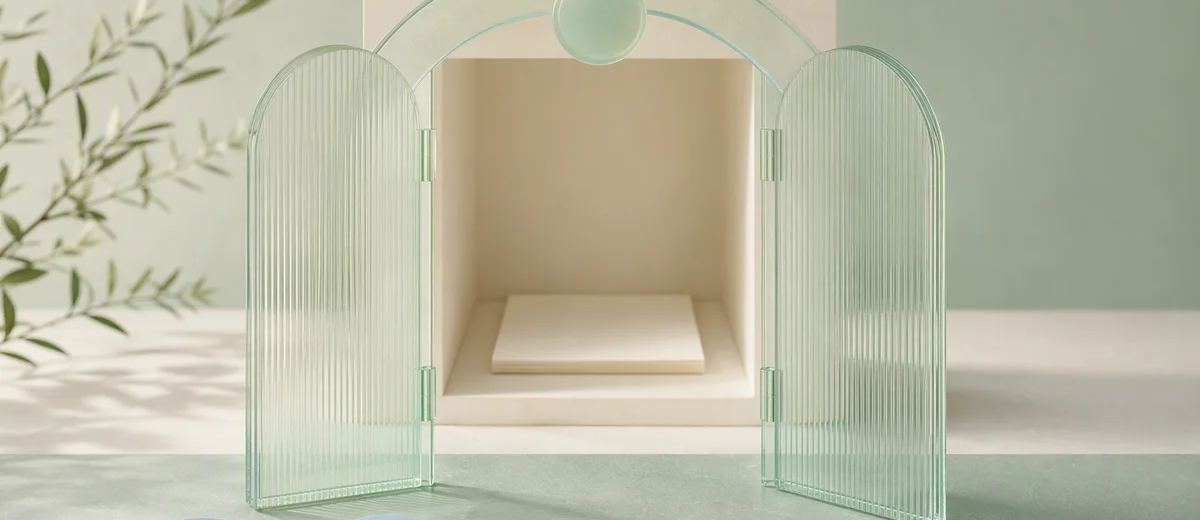 Translucent mint gates open onto a recessed ivory room, with part of a blue key in the foreground.