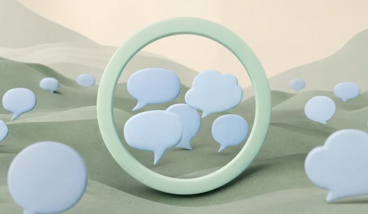 A small cluster of pale blue speech forms gathered through a mint circular frame, with many distant shapes remaining outside the frame