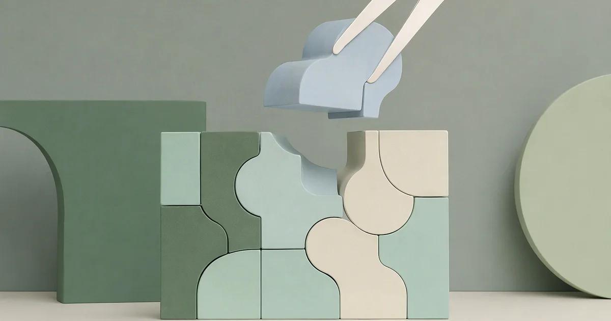 A precise mint modular sculpture has one pale blue segment lifted out with an elegant brass-free ivory clamp.