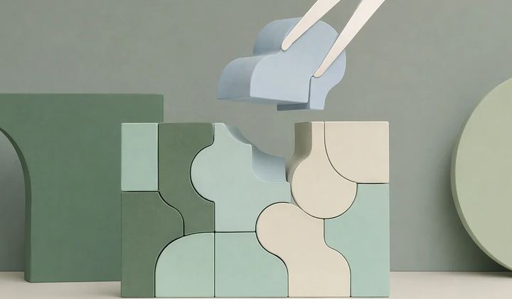 A precise mint modular sculpture has one pale blue segment lifted out with an elegant brass-free ivory clamp.