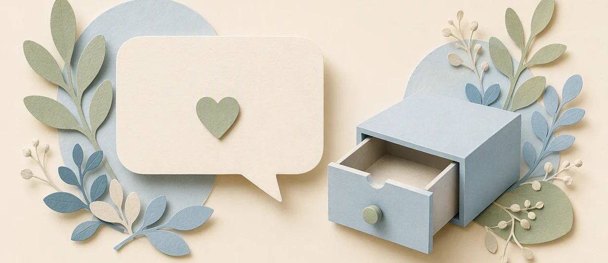 A paper speech bubble with a heart sits beside a partly open blue drawer.