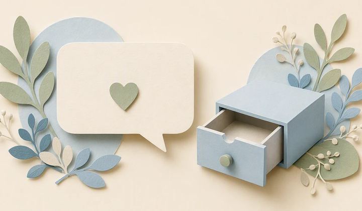 A paper speech bubble with a heart sits beside a partly open blue drawer.