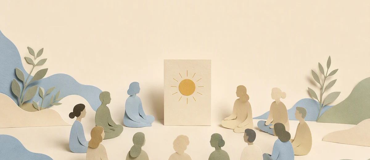 Paper figures sit in a circle around a standing card with a sun symbol.