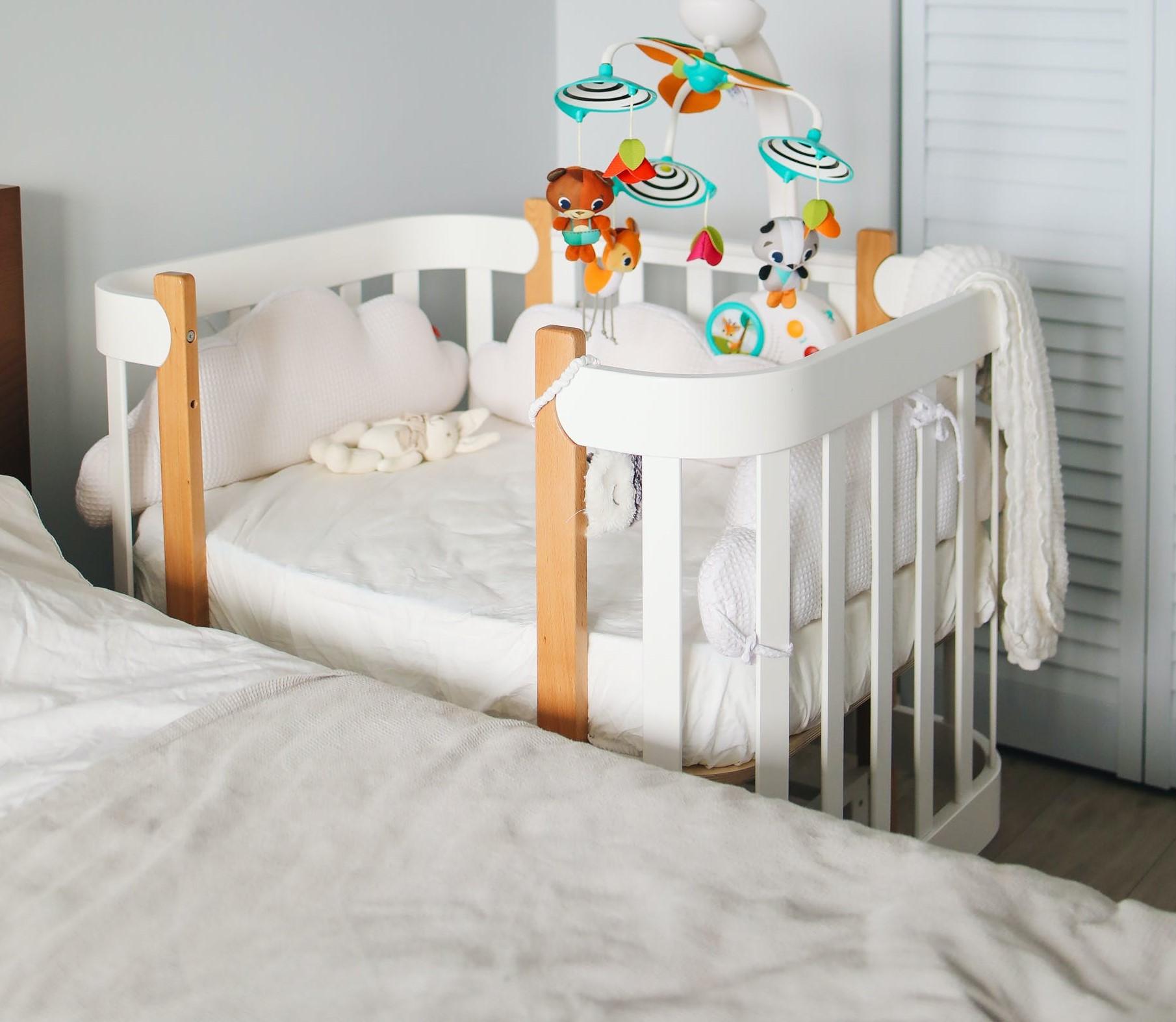 Do You Need a Mattress Pad for Your Baby's Crib? Bumpy Beds An