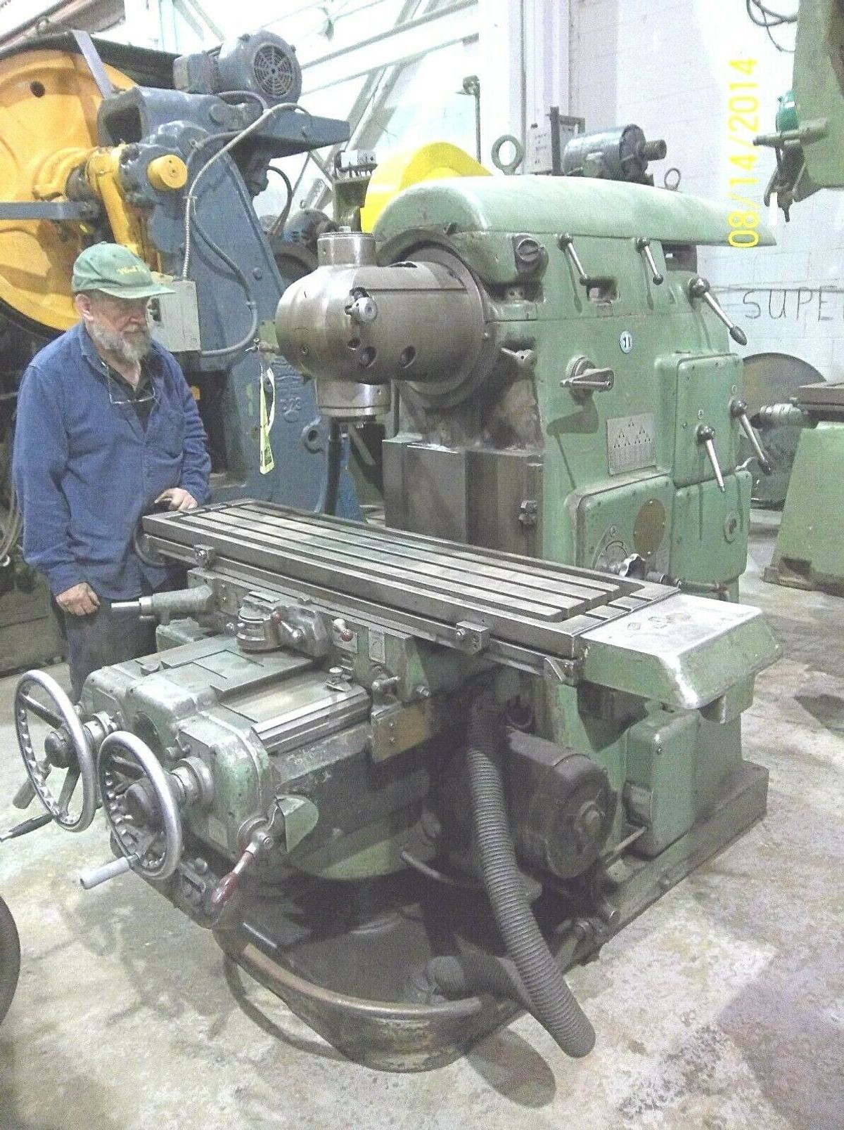 Vertical Milling Machine, Universal Head, 40 speeds, Feeds + Rapid Trav X,Y & Z