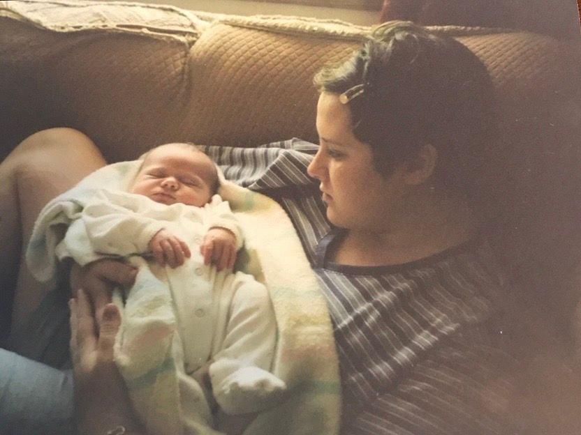 Dr Hoefer at 21 with her newborn daughter