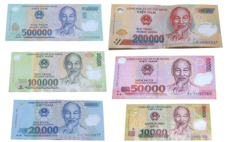 越南盾各面額紙鈔排列對比，包括 10,000、50,000、100,000、200,000、500,000 越盾 / Win Royal Spa 皇家越式按摩