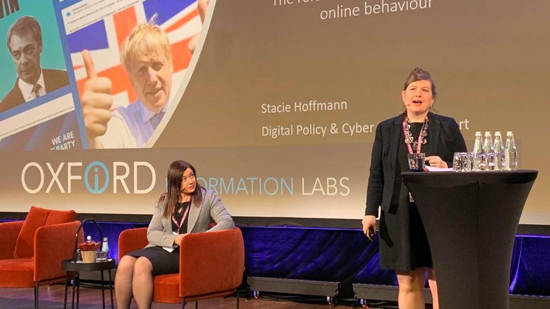 Stacie at Nato, discussing the Market of Disinformation Study