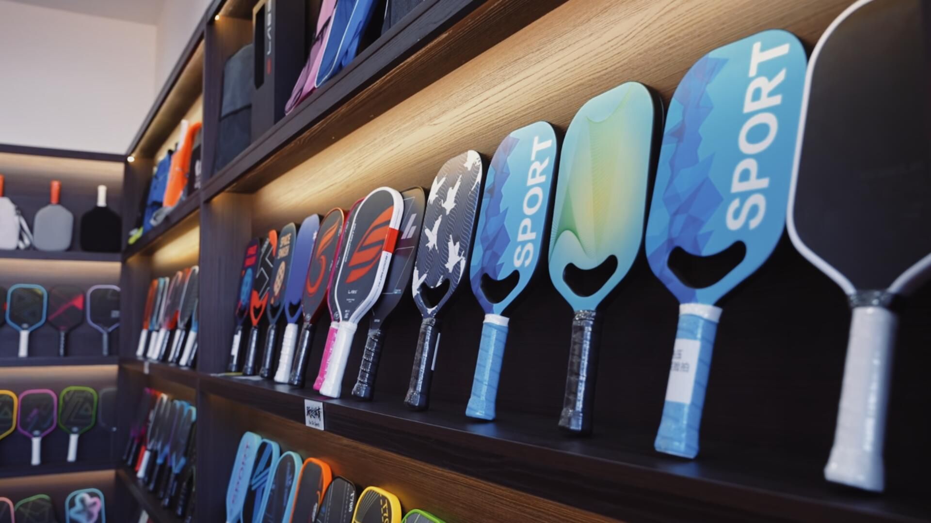 Carbon fiber pickleball paddle production on a source factory line