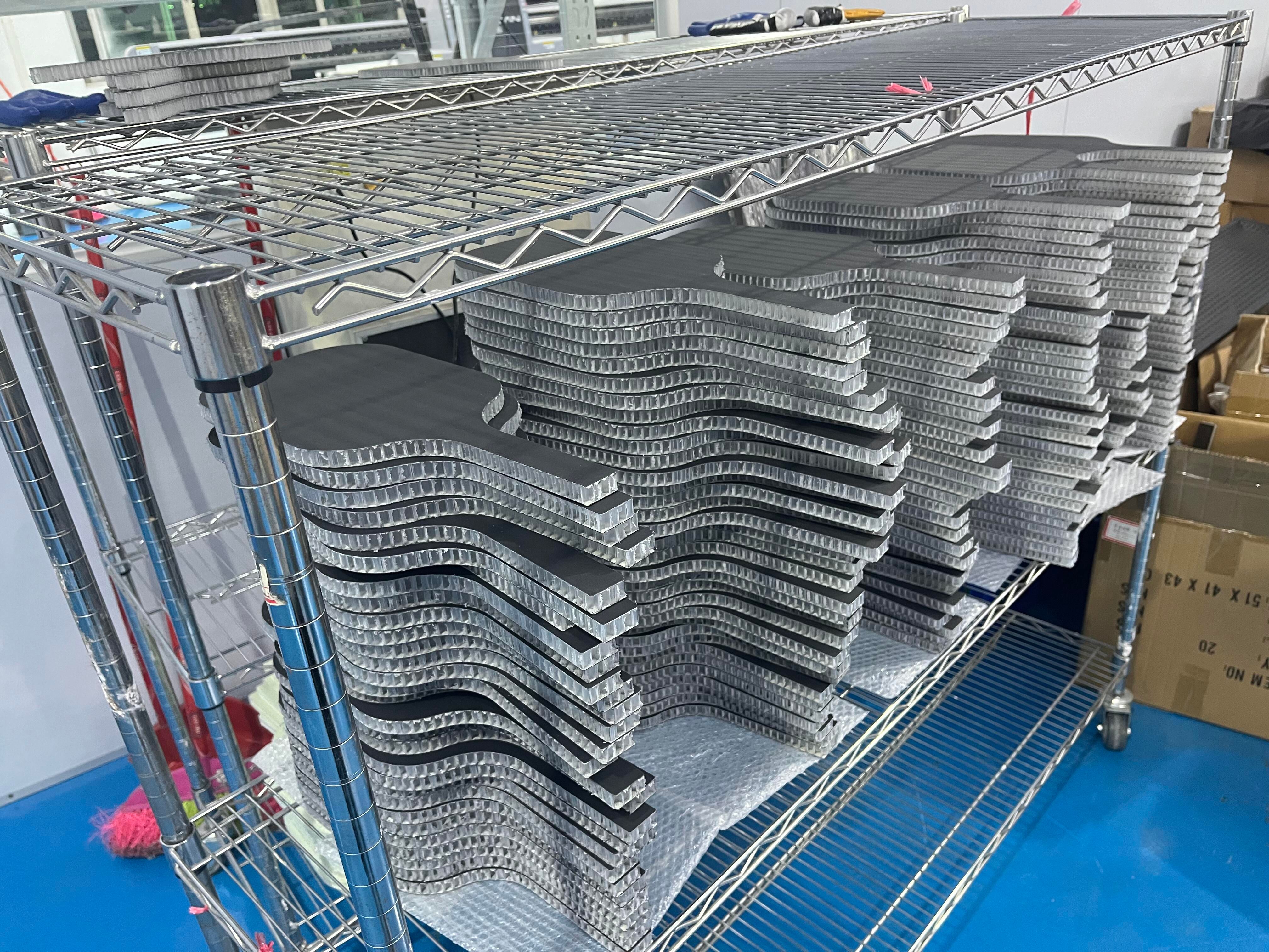 Quality inspection of pickleballs on a source factory floor before packing