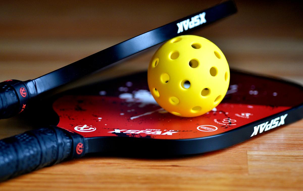 Professional photography representing Pickleball Paddle Specs: Sample vs Production Gap, high quality, no text