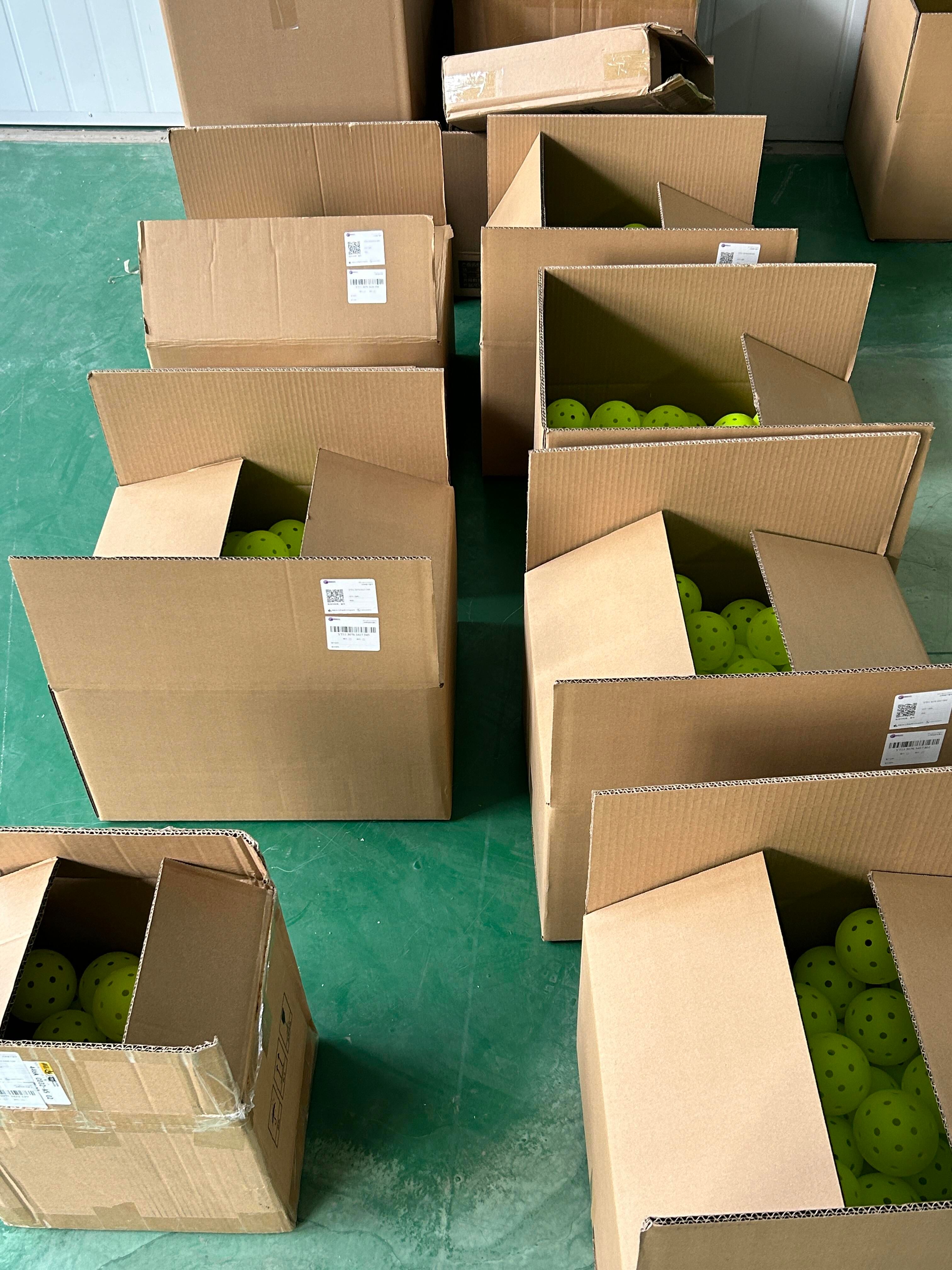 Pickleball order packed in cartons ready for export to Canada, where CARM registration is required to clear