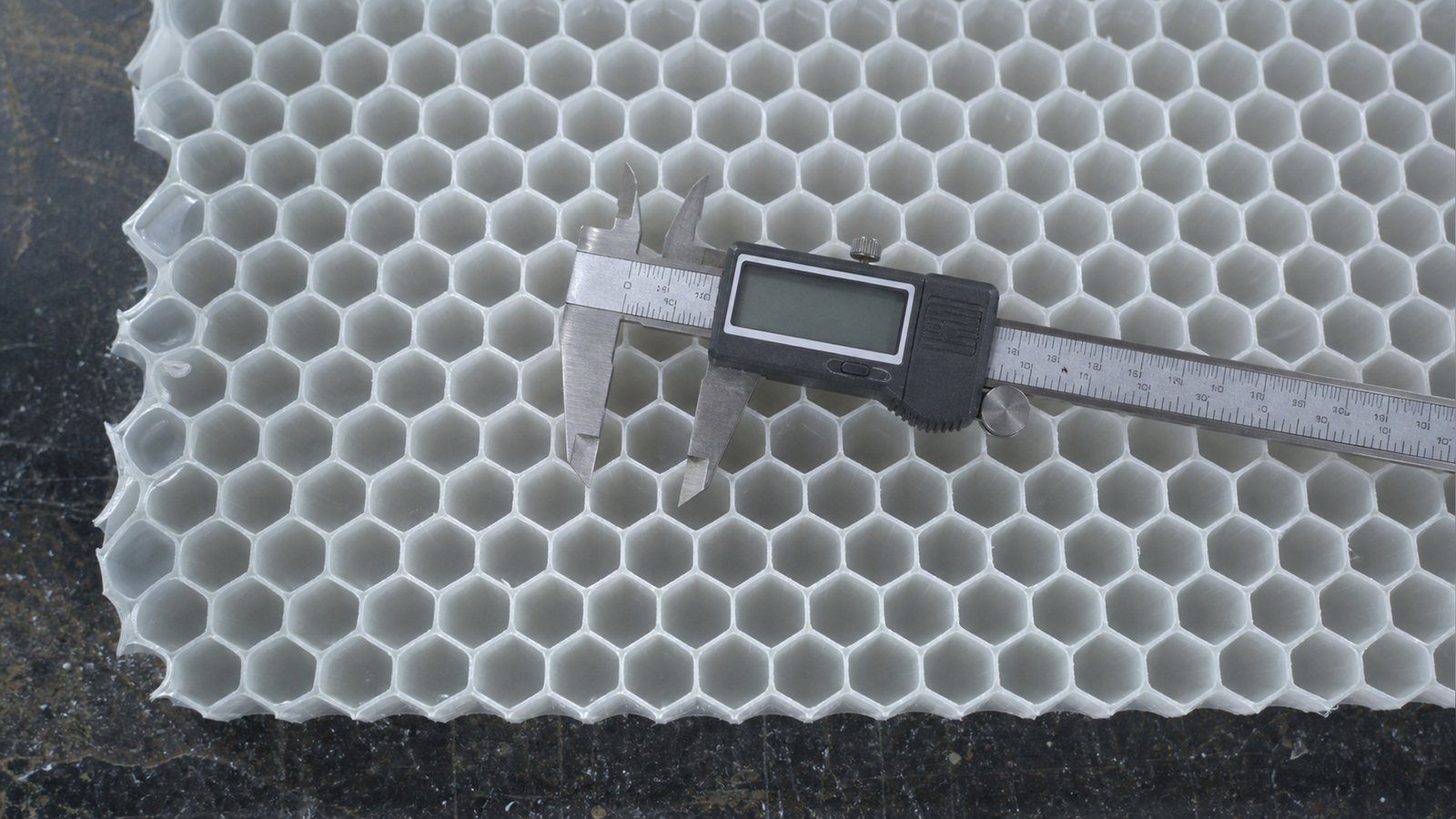 Macro view of polypropylene honeycomb core cells before bonding to a pickleball paddle face