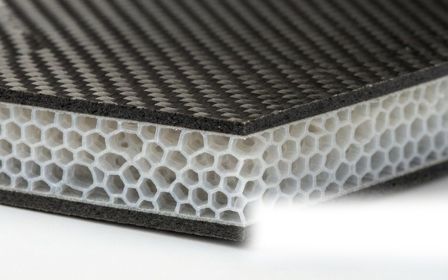 Pickleball paddle cross-section showing carbon fiber face, honeycomb core, and edge guard layers
