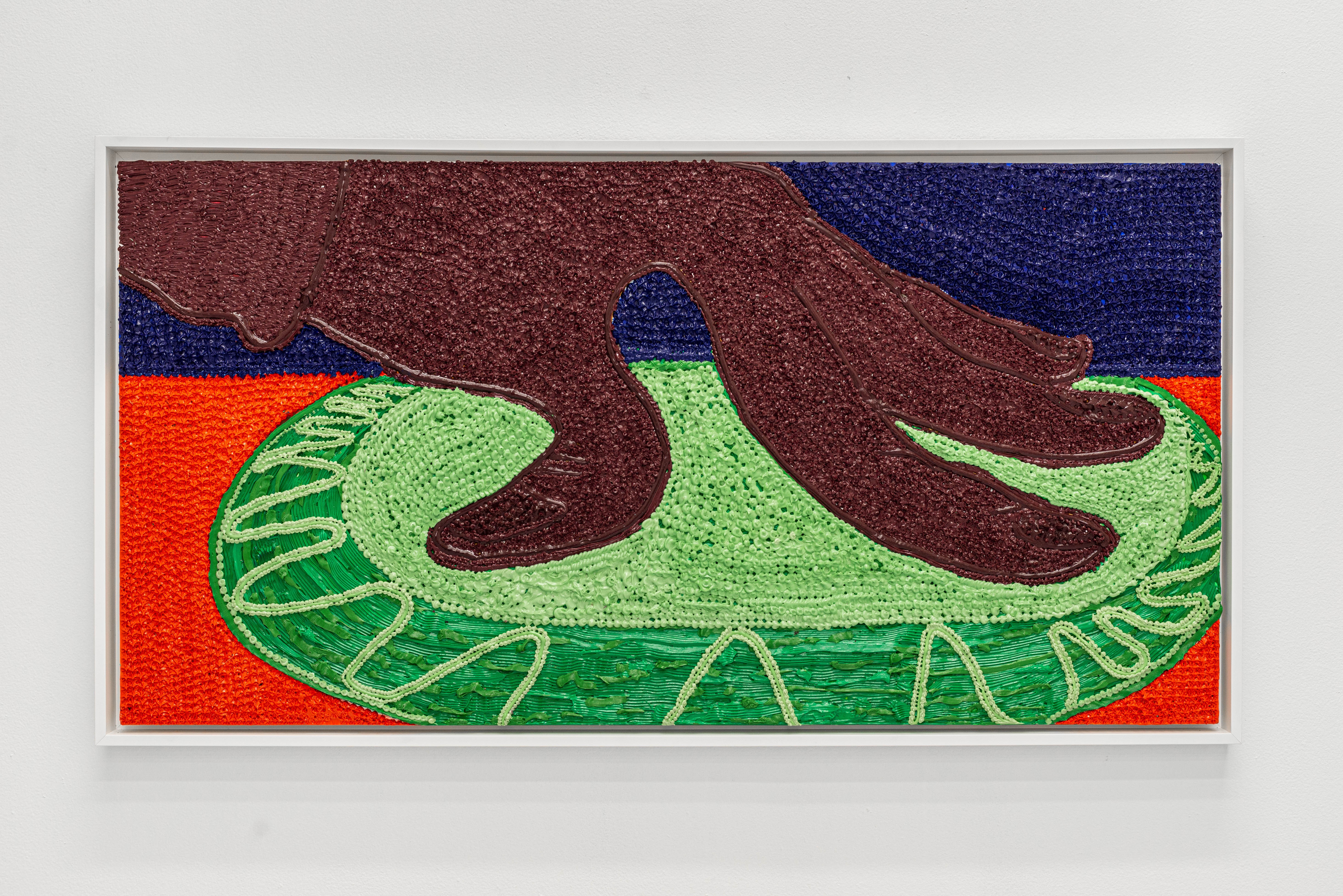 A photograph of a textured painting depicting a brown coloured hand spreading its fingers on a green decorated oval on a red surface. 