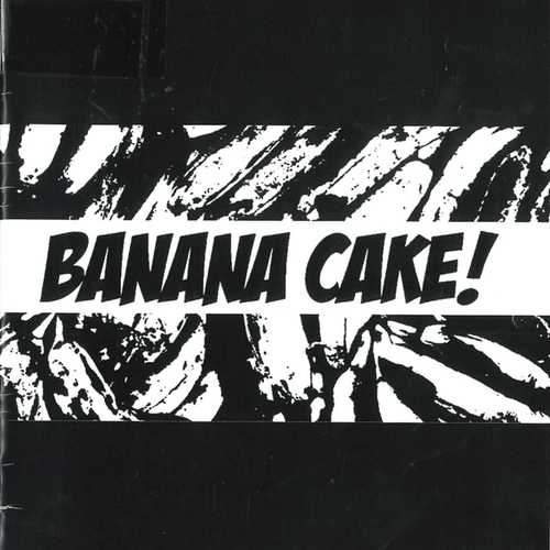 A black and white photo of bananas on a black background with the words "BANANA CAKE!" in bold black text. 