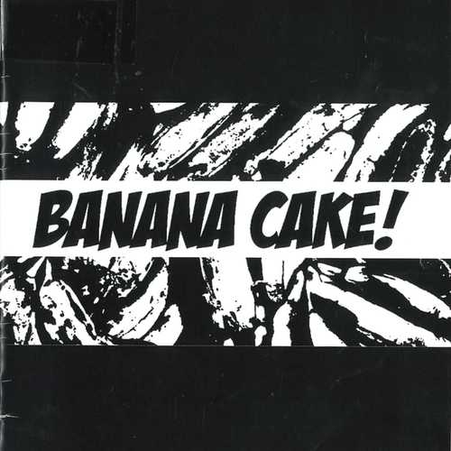 A black and white photo of bananas on a black background with the words "BANANA CAKE!" in bold black text.