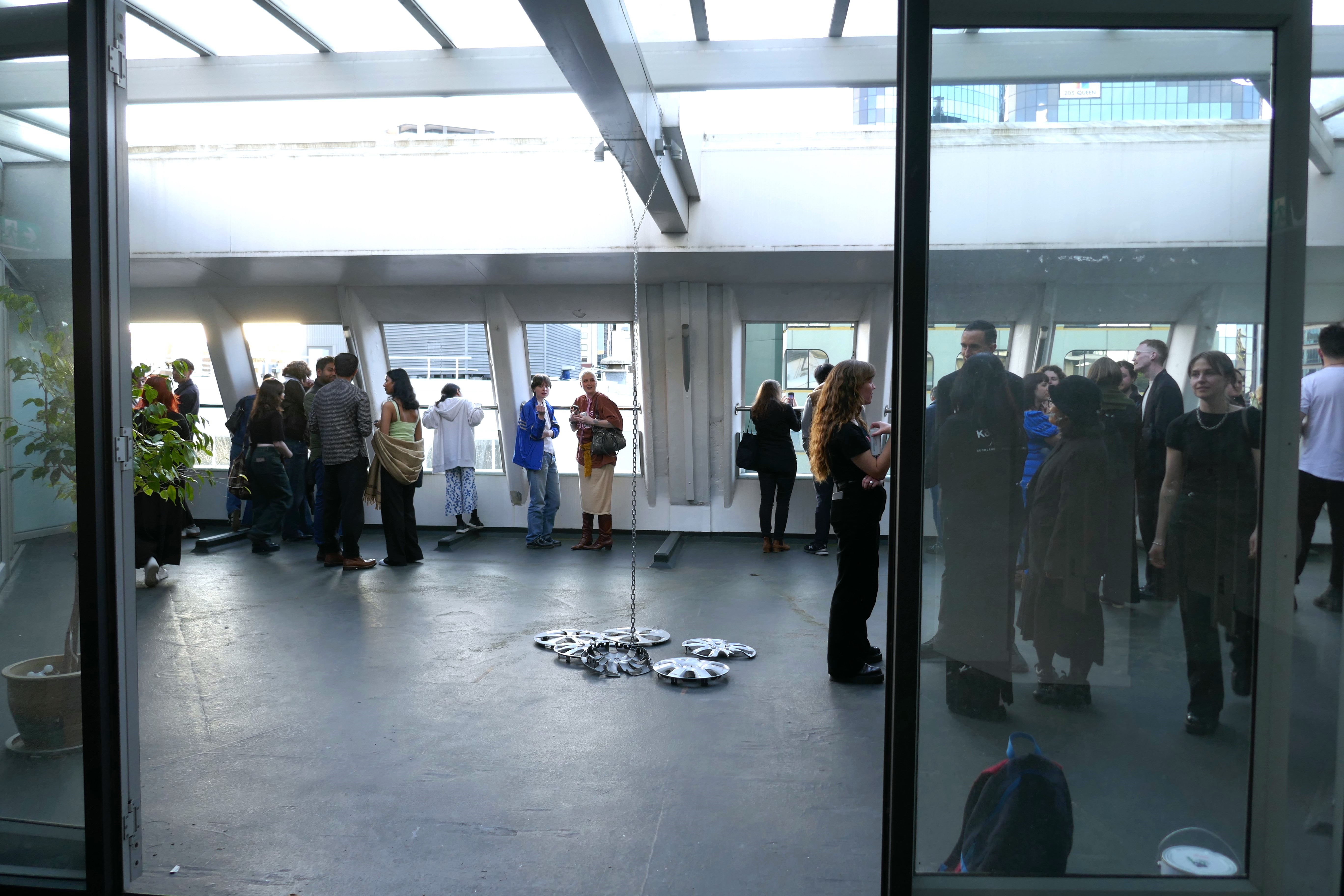 People standing in a building's courtyard