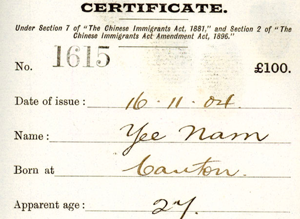 A certifcate with somebody's name, birth place and age with 100 pounds written in the corner