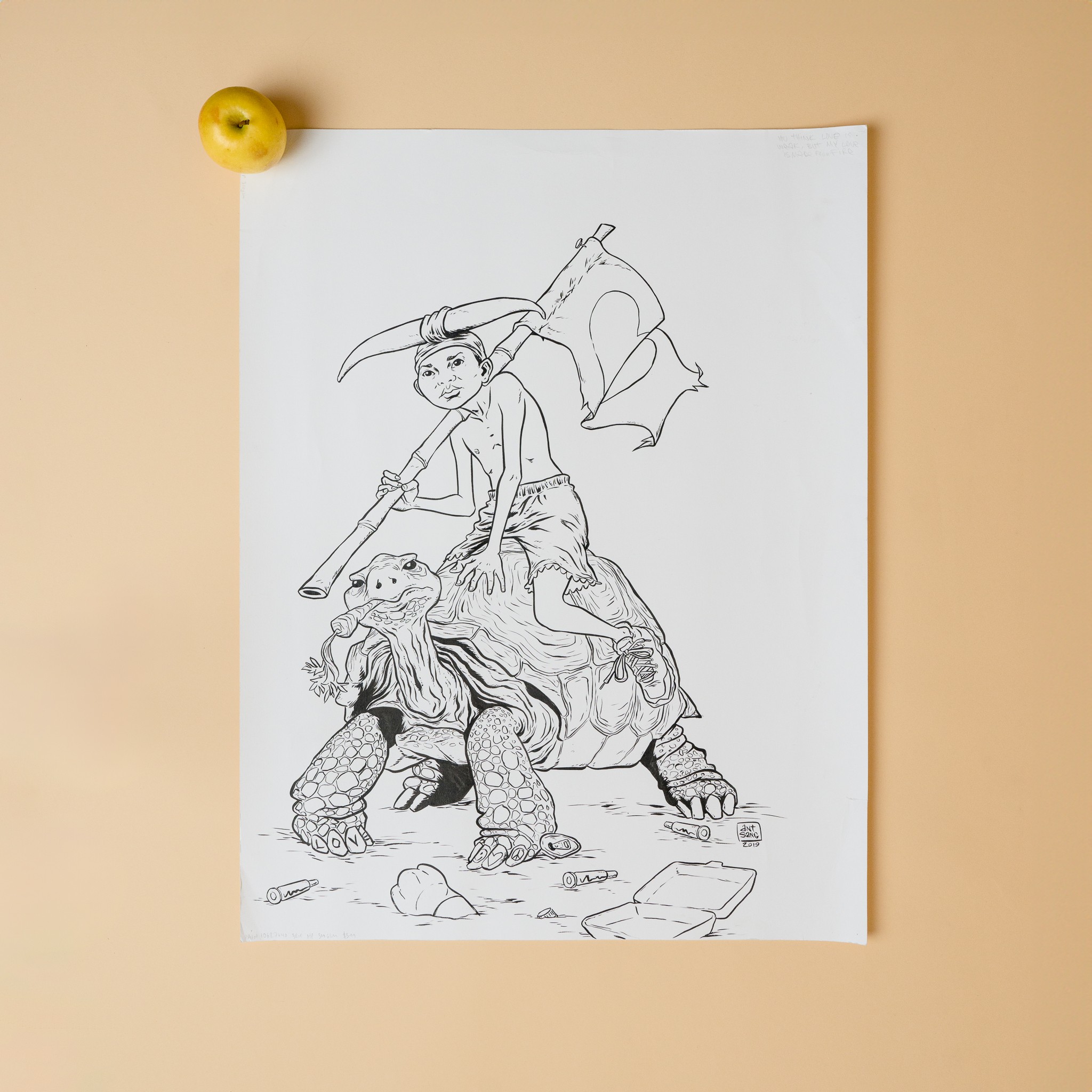 A large drawing of a boy riding a turtle