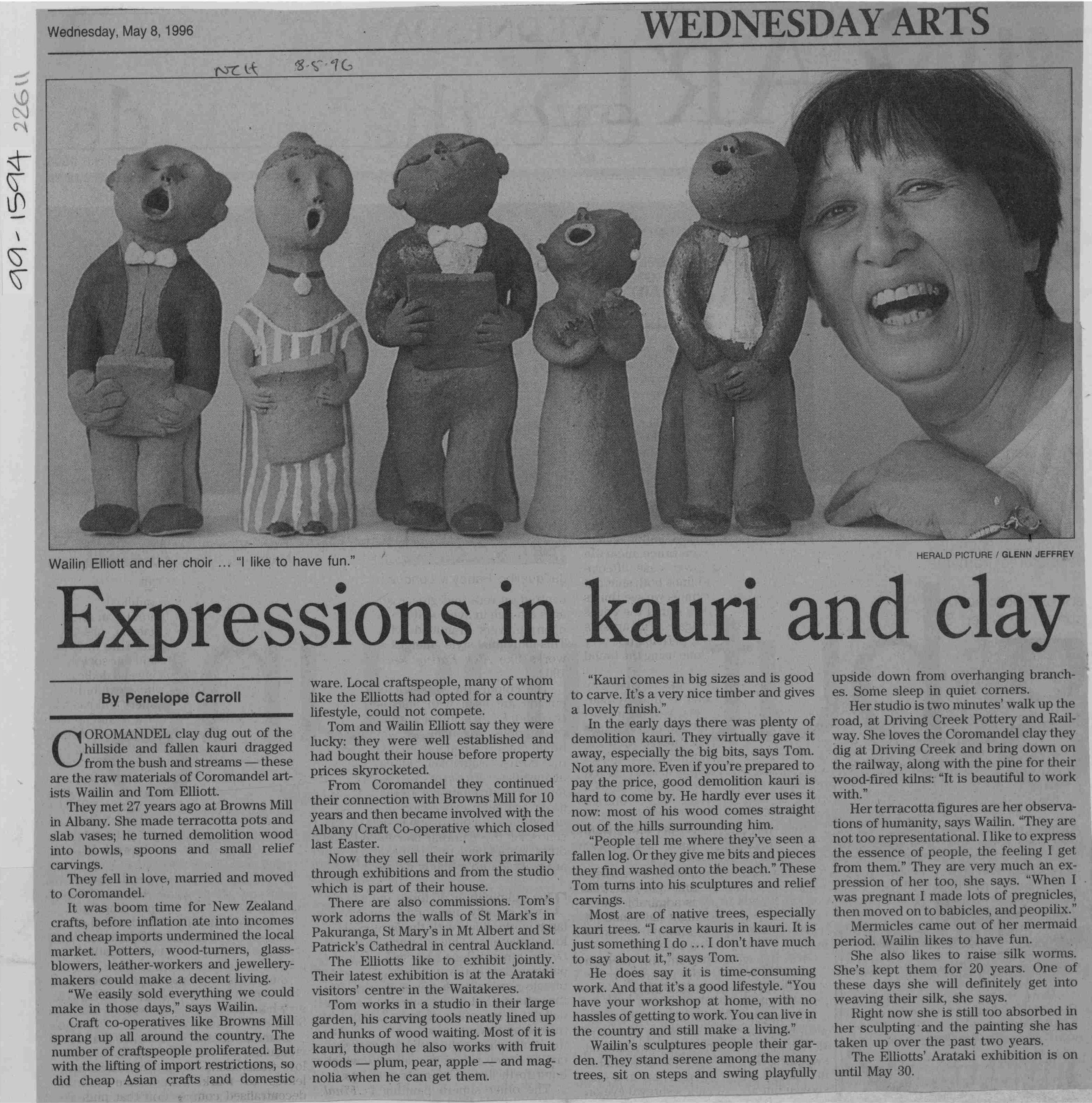 Newspaper clipping with photo of Wailin Elliott with singing clay sculptures.