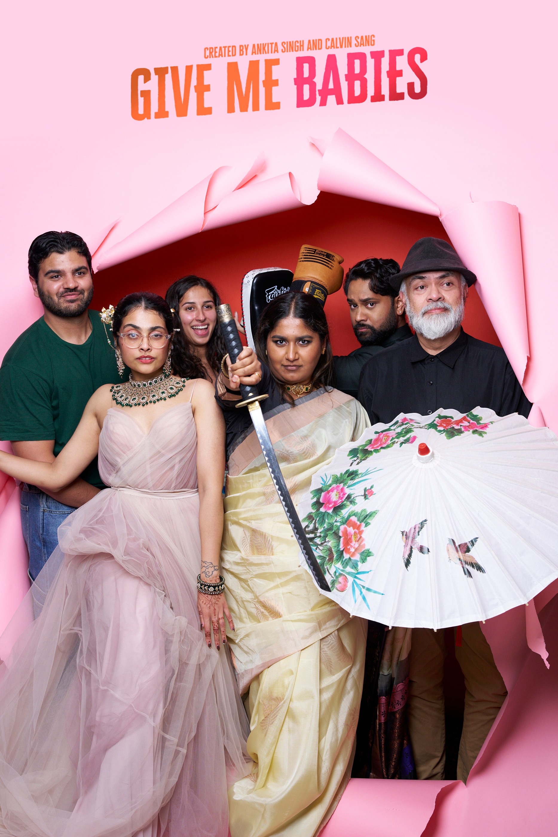 People posing for a photograph in a pink frame