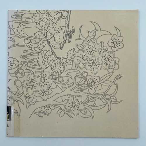 A light brown cover of a square book with a line drawing of cherry blossoms.