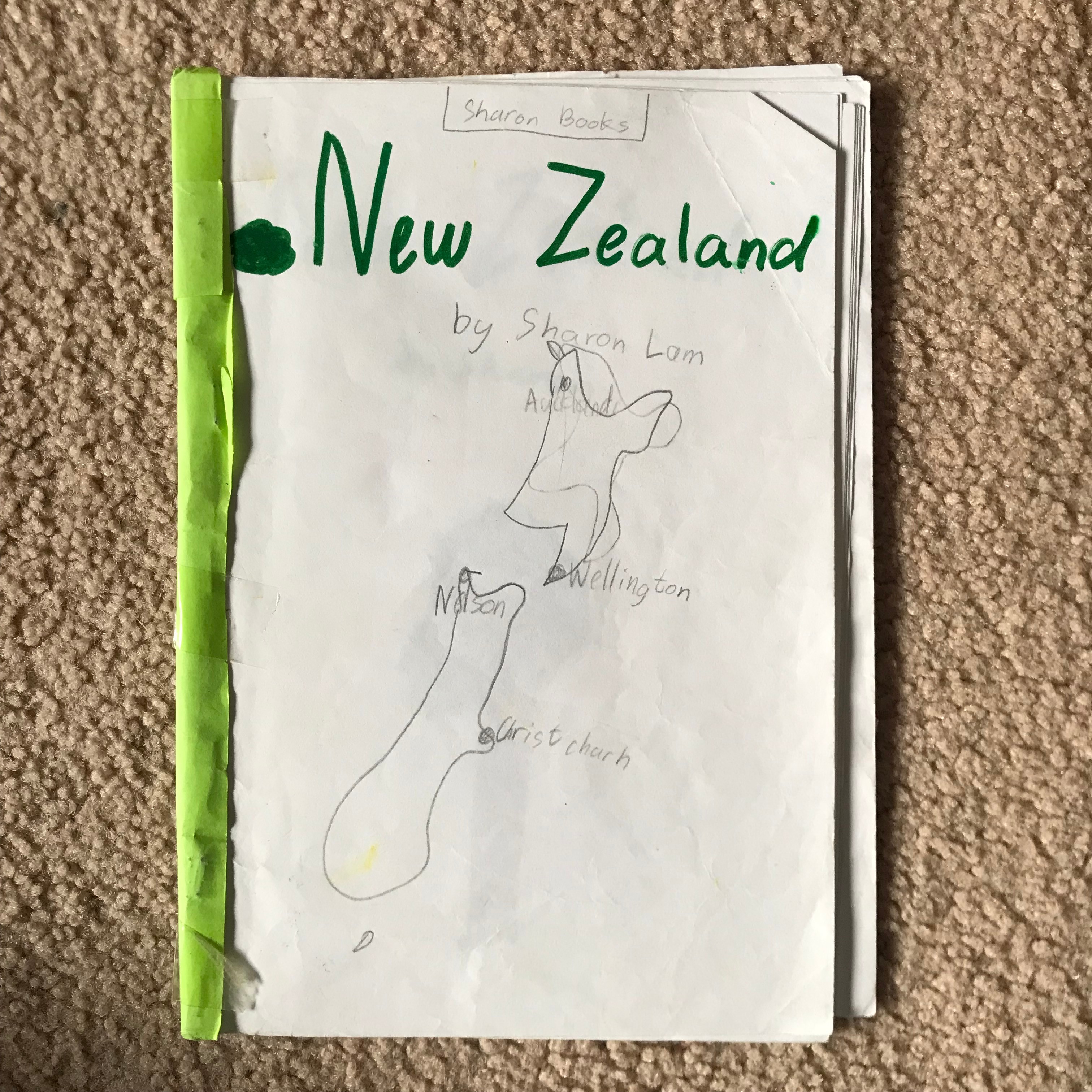 a hand drawn book cover with "New Zealand" map