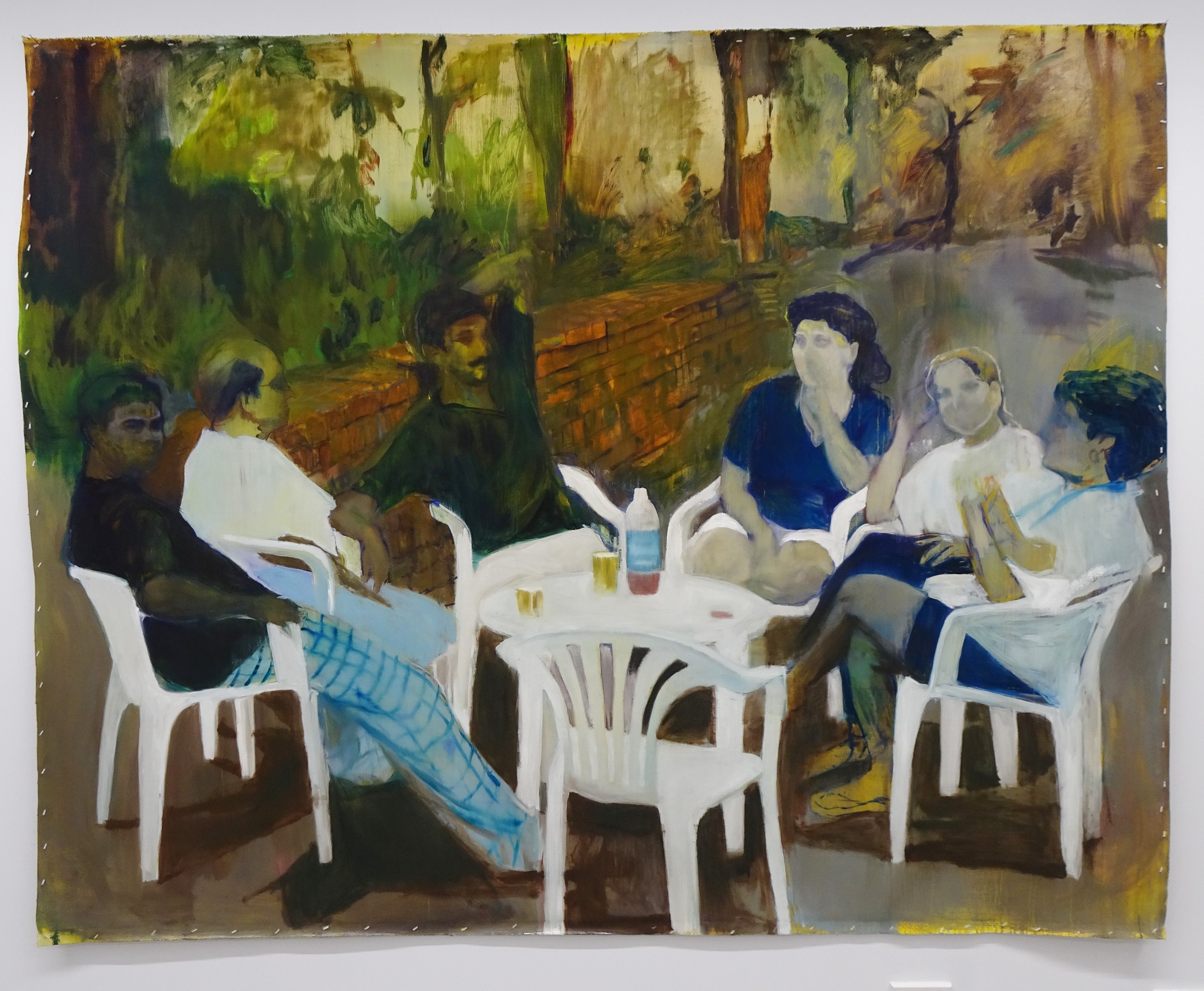 Oil painting featuring six adults socialising around a white table, sitting in white plastic chairs, outdoors surrounded by autumnal trees