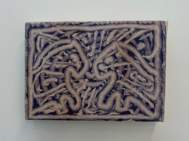 A blue and white rectangular painting