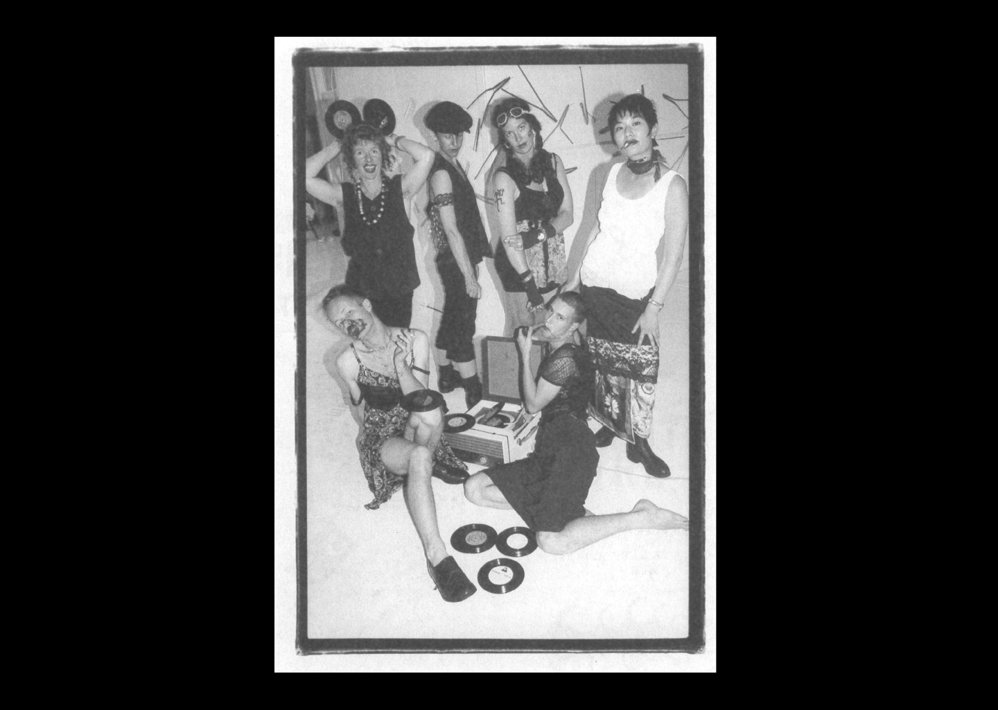 Black and white group portrait of artists.