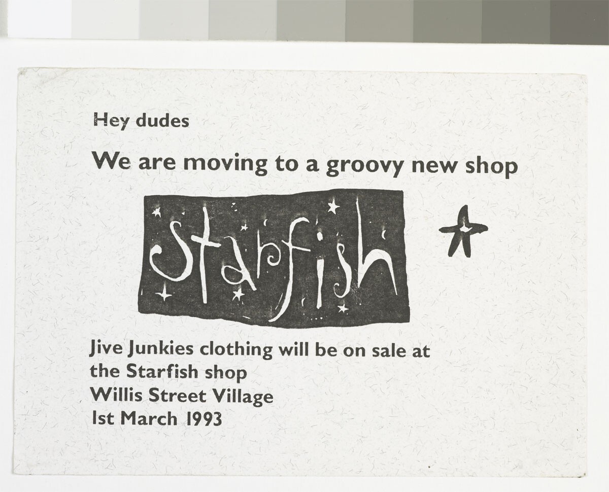 Paper sign with the Starfish logo and info about a new shop location.