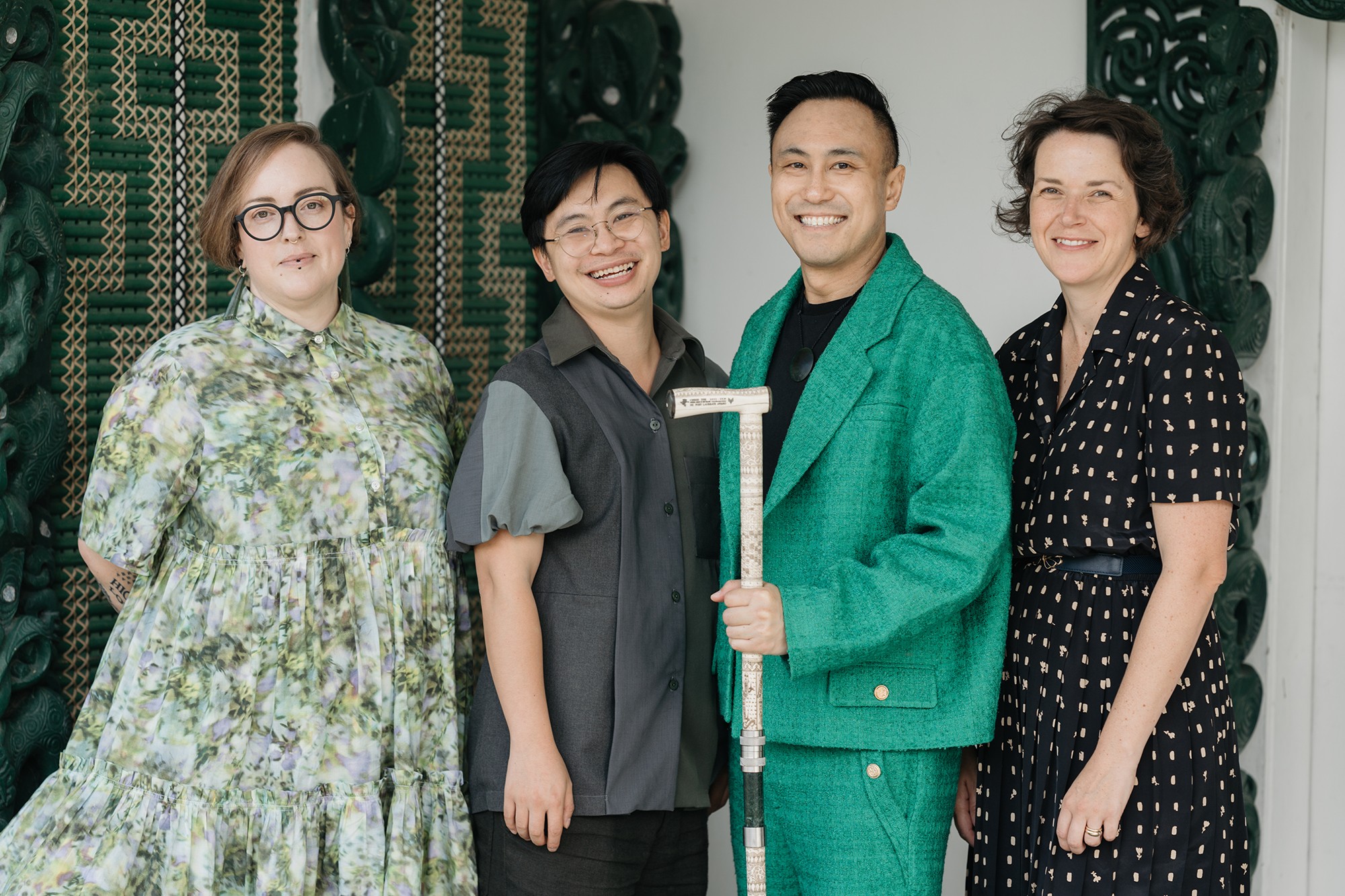 Group photograph in front of tukutuku panels.