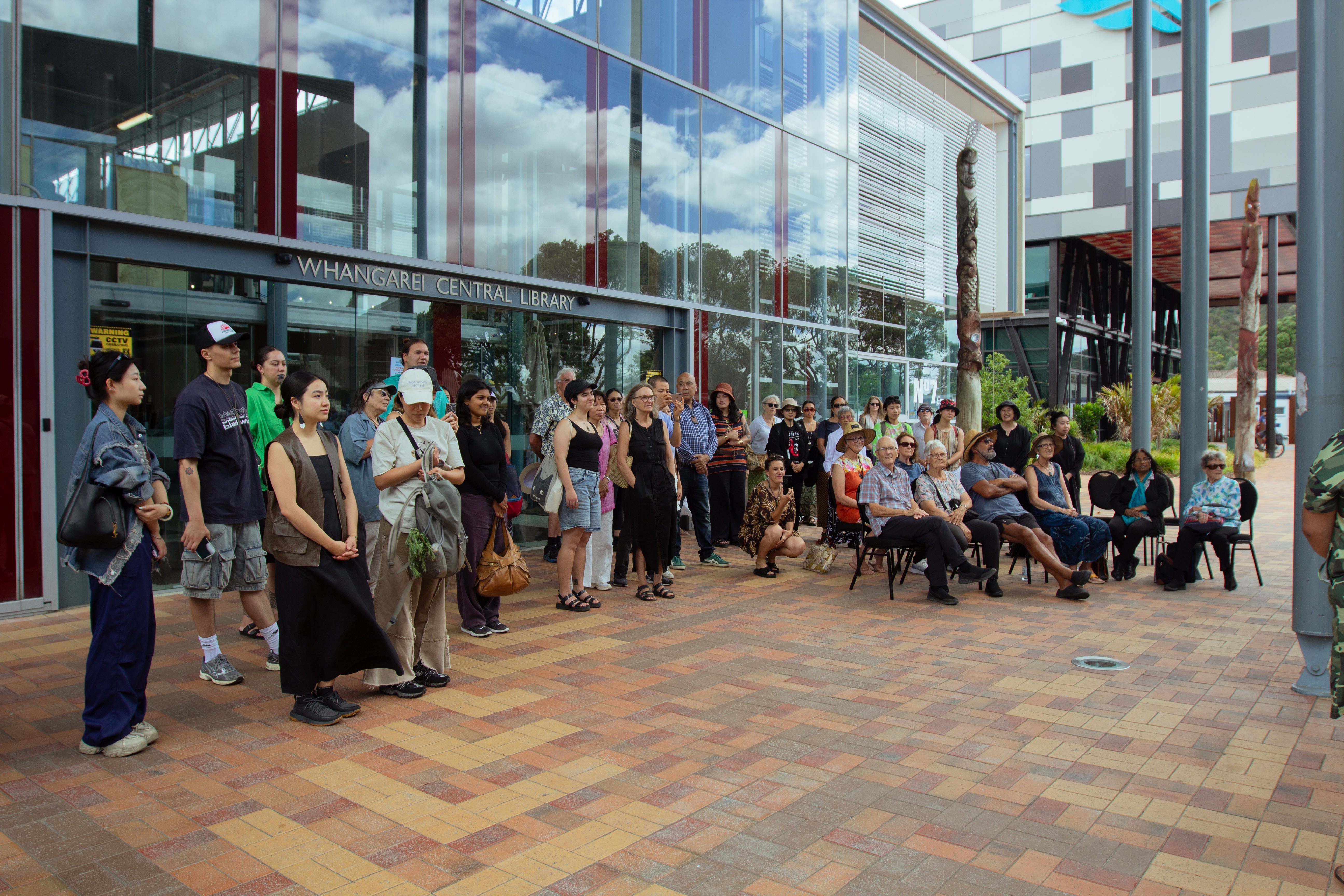 Group of people standing outside the Whangarei Central Library