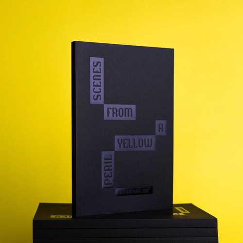 A stack of black books on a bright yellow background.