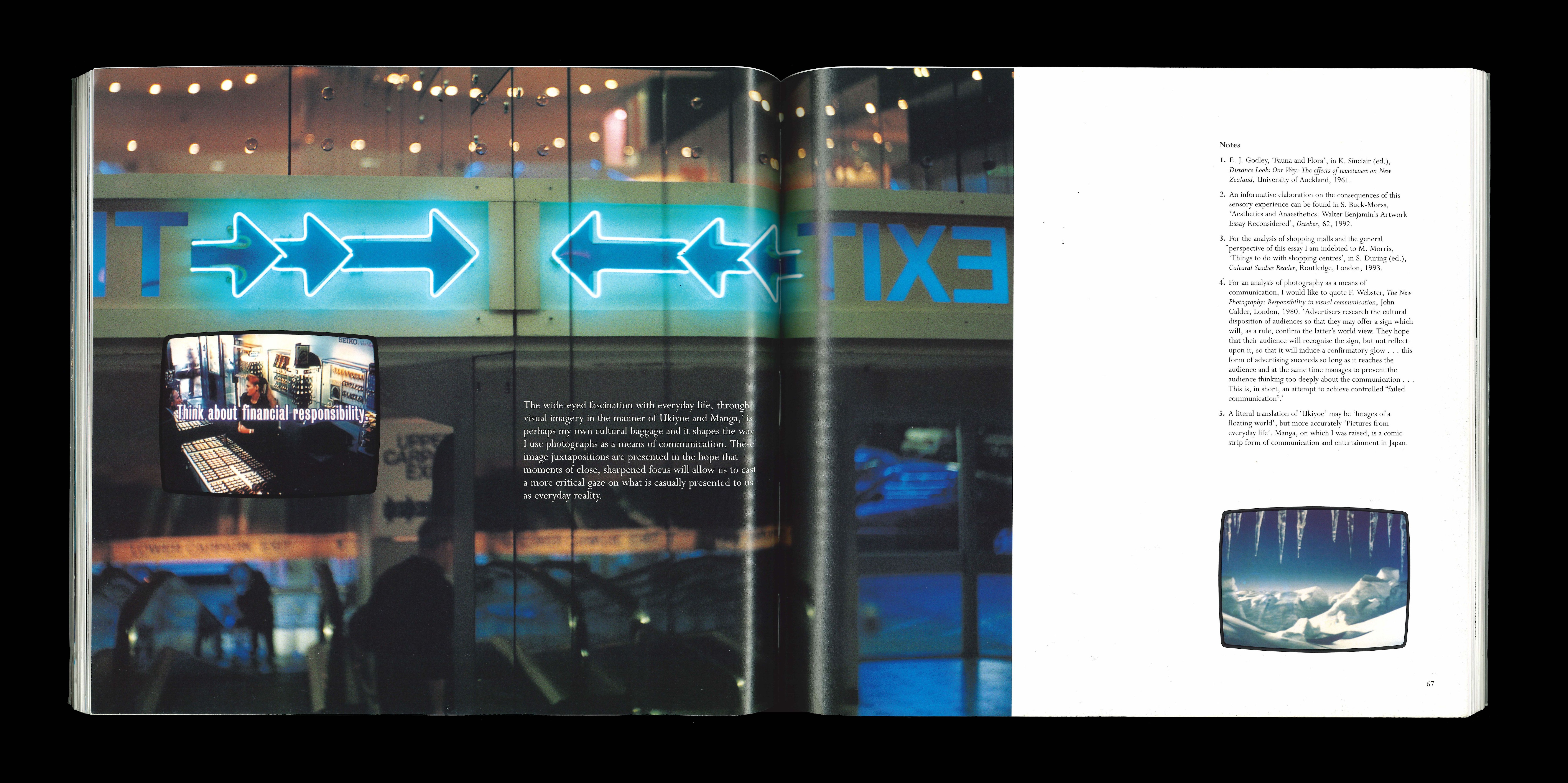 A photograph of a glass banister at the shopping mall fills one page, and the book's title page faces it.