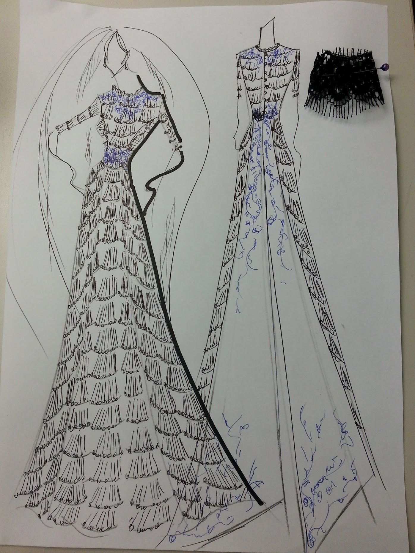 A fashion illustration of a long gown adorned in black lace, pinned to the illustration is a piece of black lace