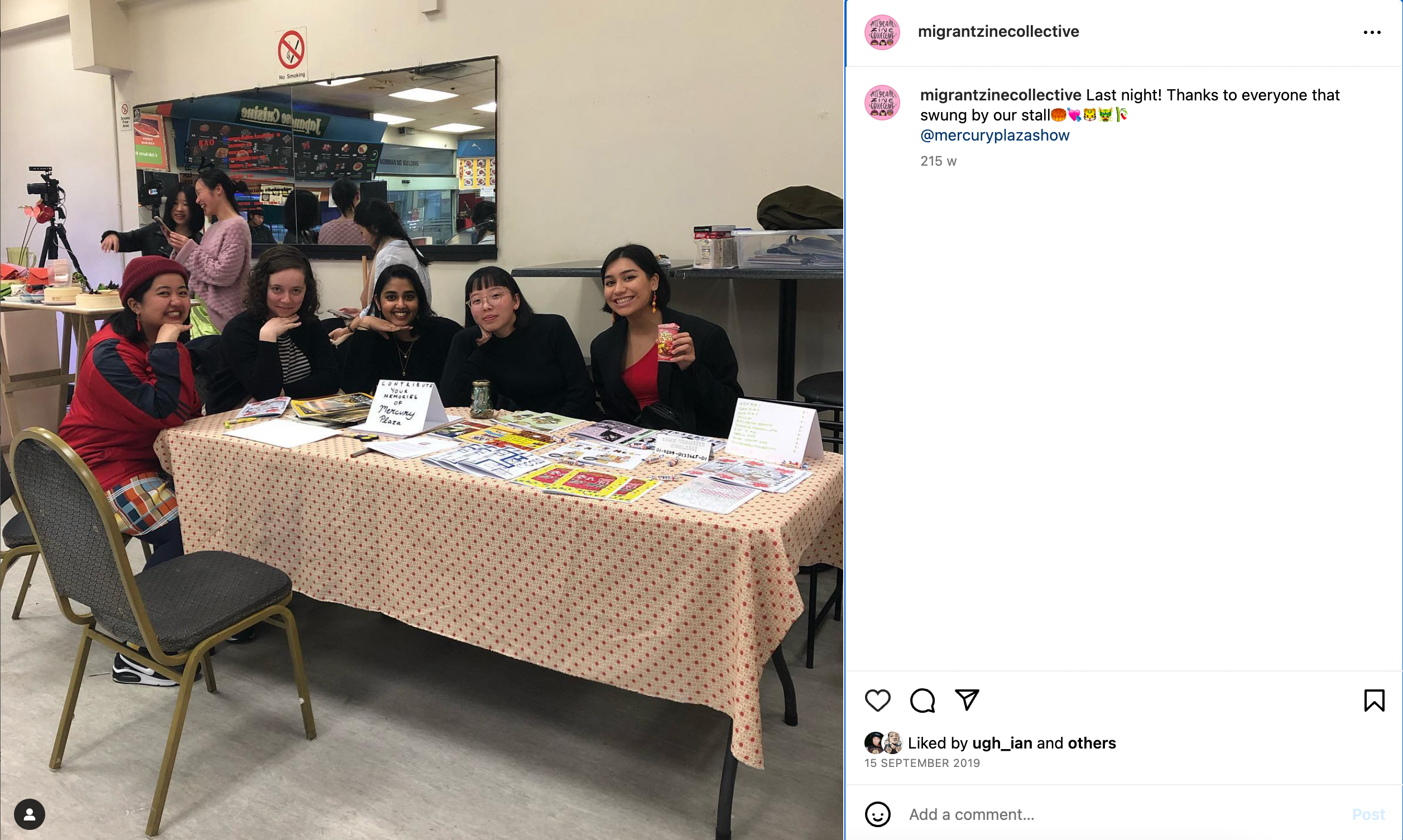Five people smiling around a table displaying various zines displayed.