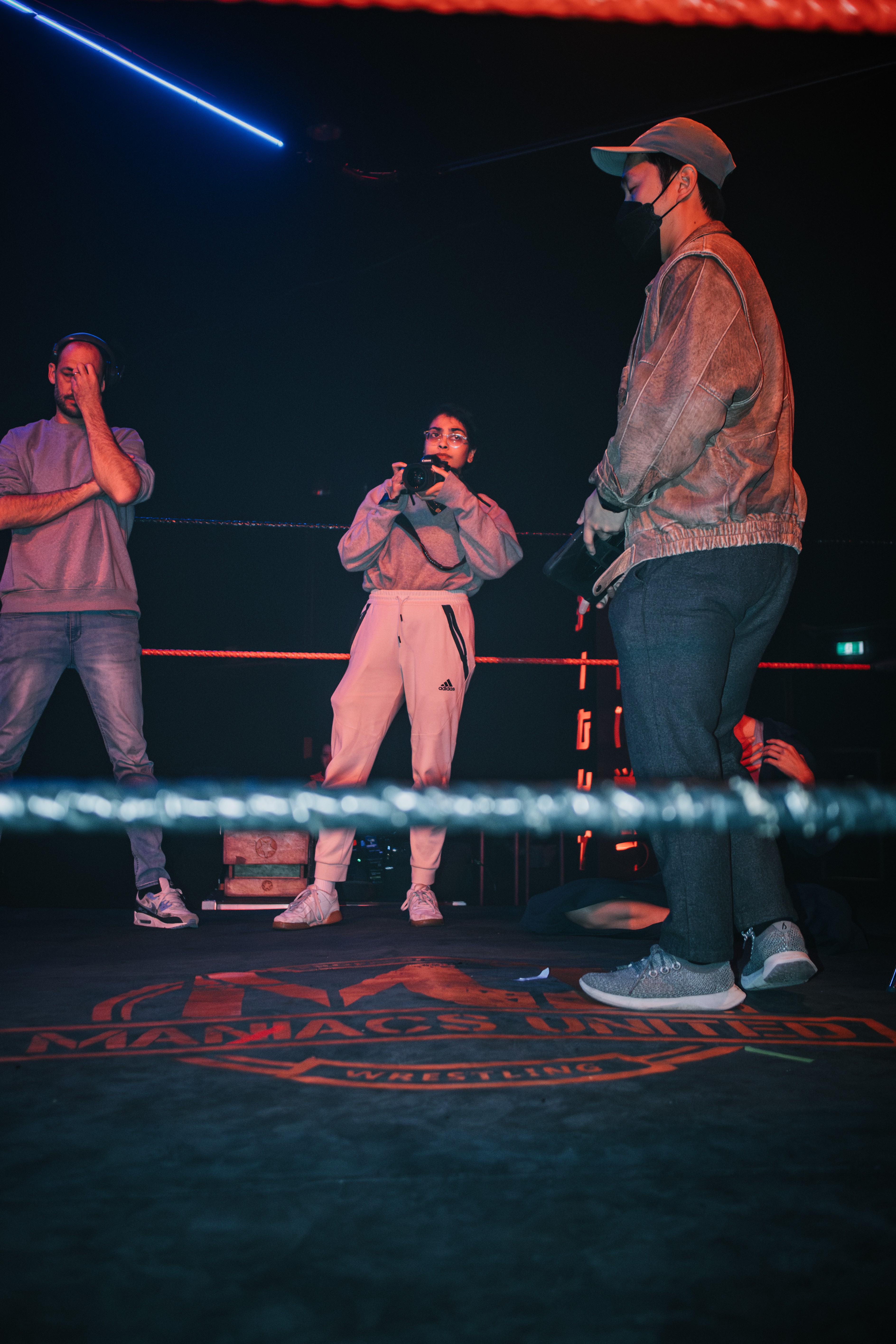 People standing in a boxing ring