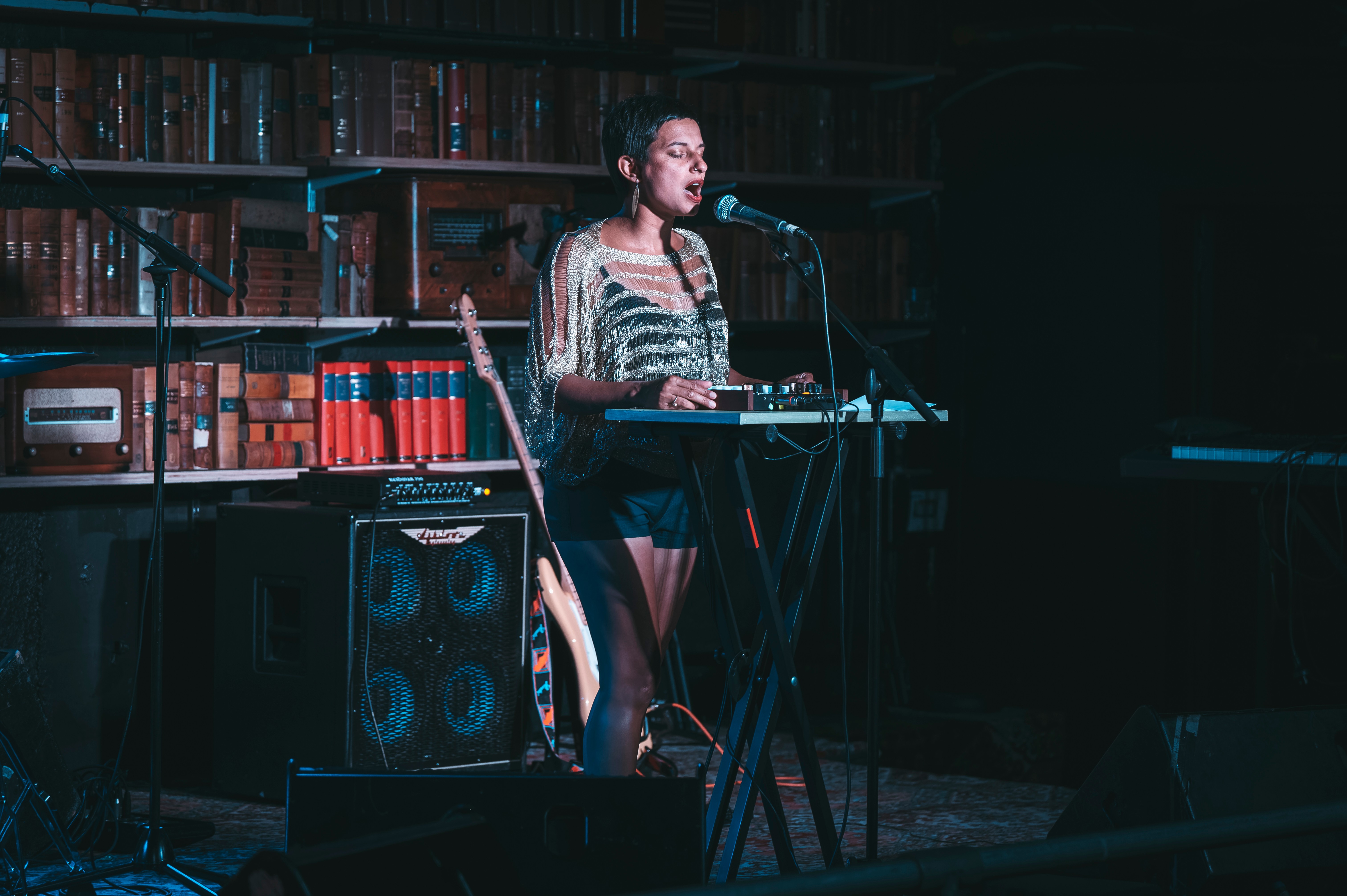 A person singing on a stage