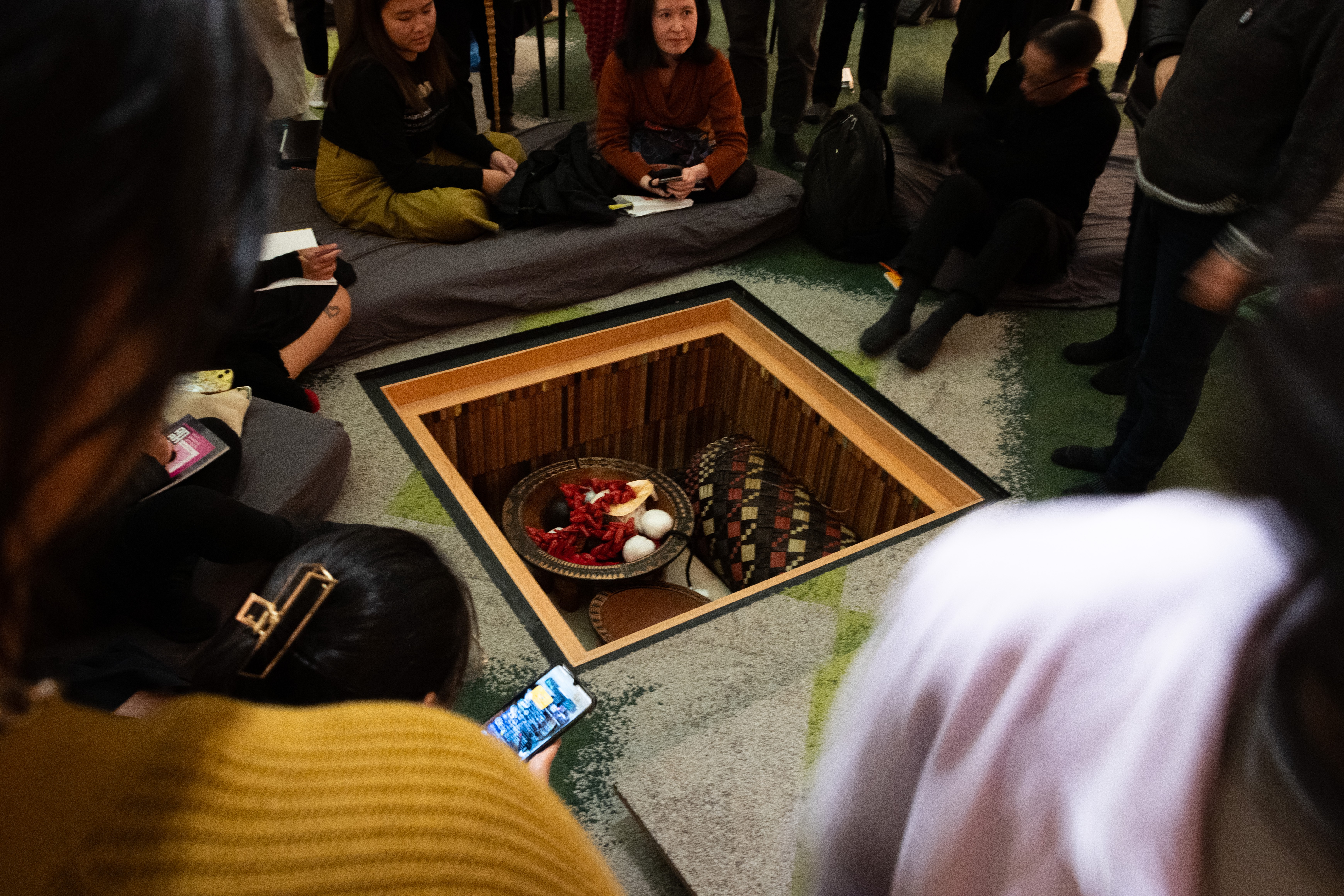 Close up of a part of the floor in the marae that opens to become storage