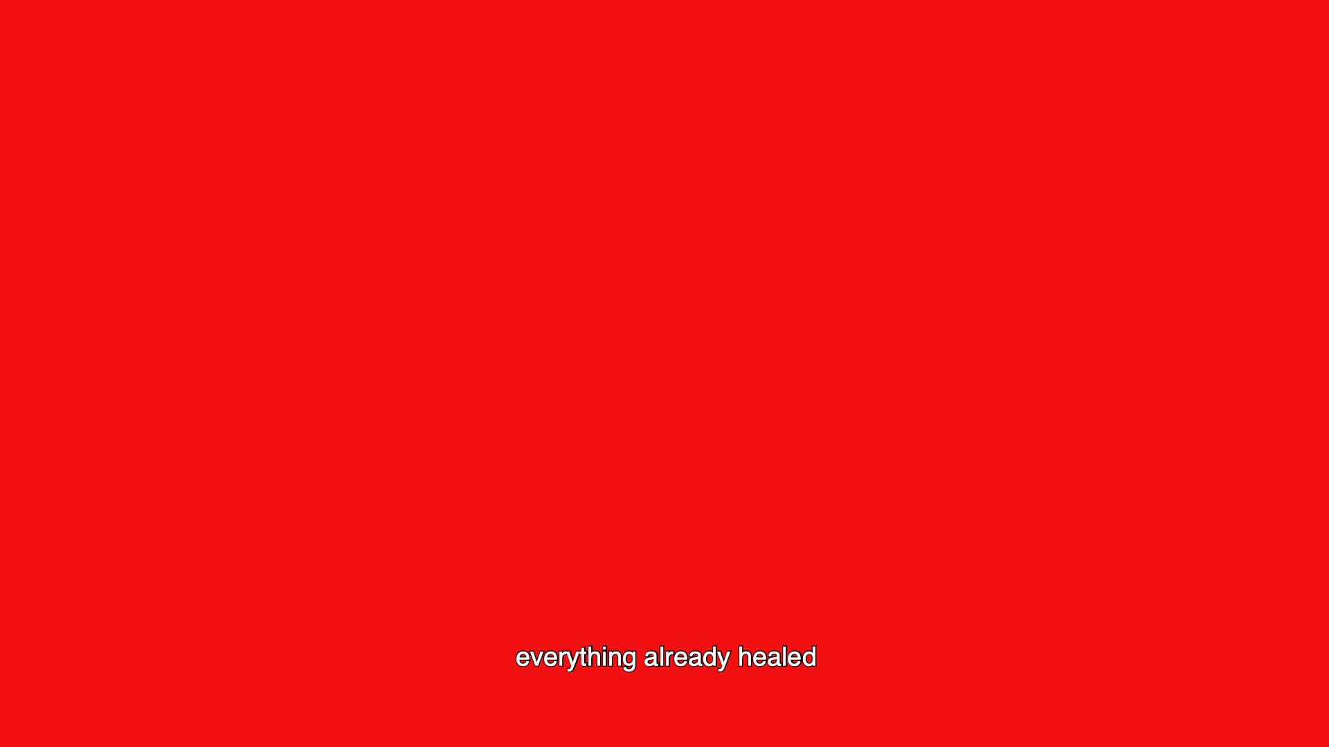 Bright red background with the words 'everything already healed.'