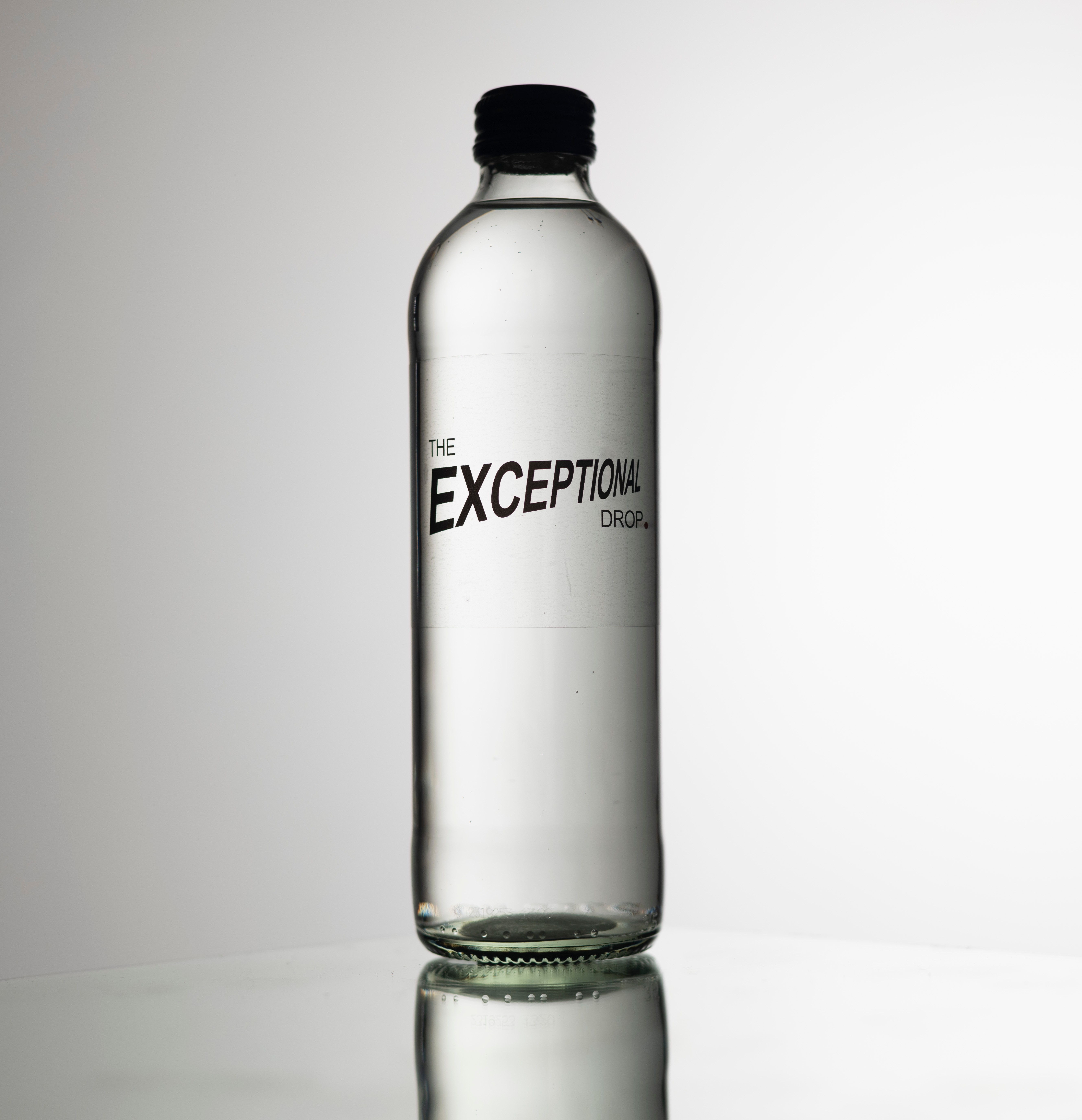 A bottle of water with the text 'Exceptional drop' on the side